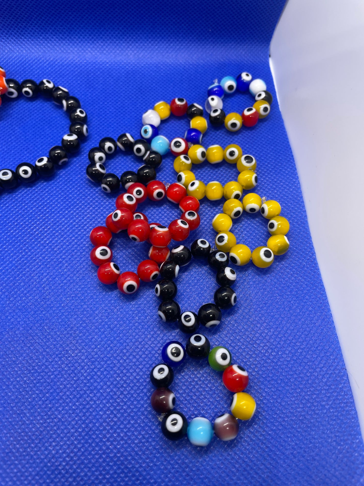 Evil eye beaded bracelets & rings