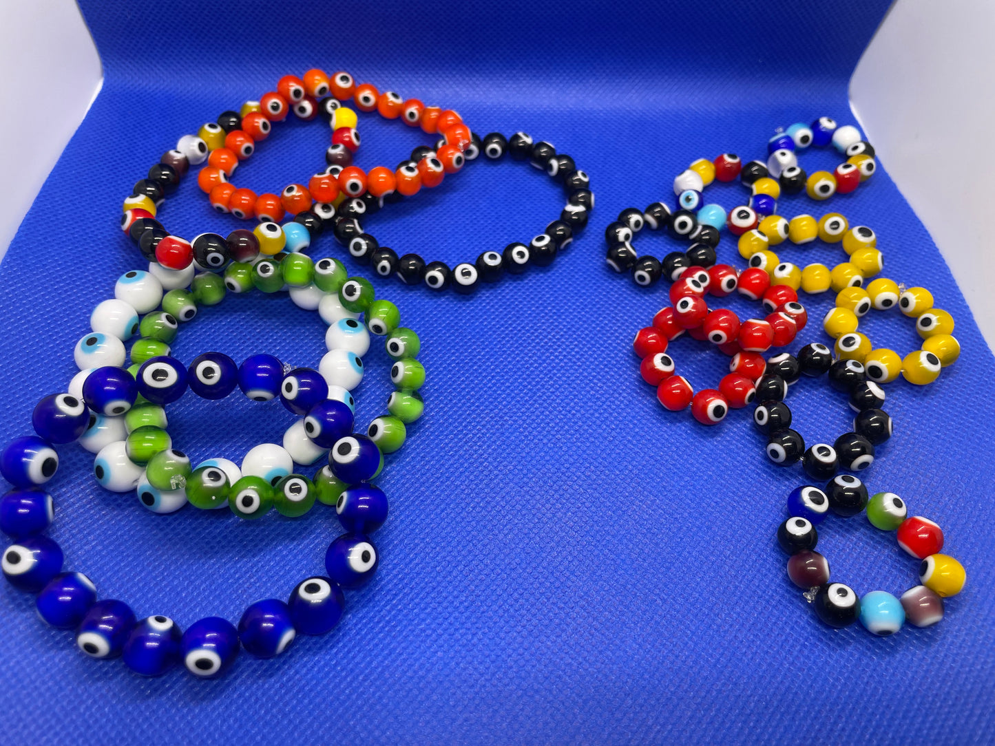 Evil eye beaded bracelets & rings